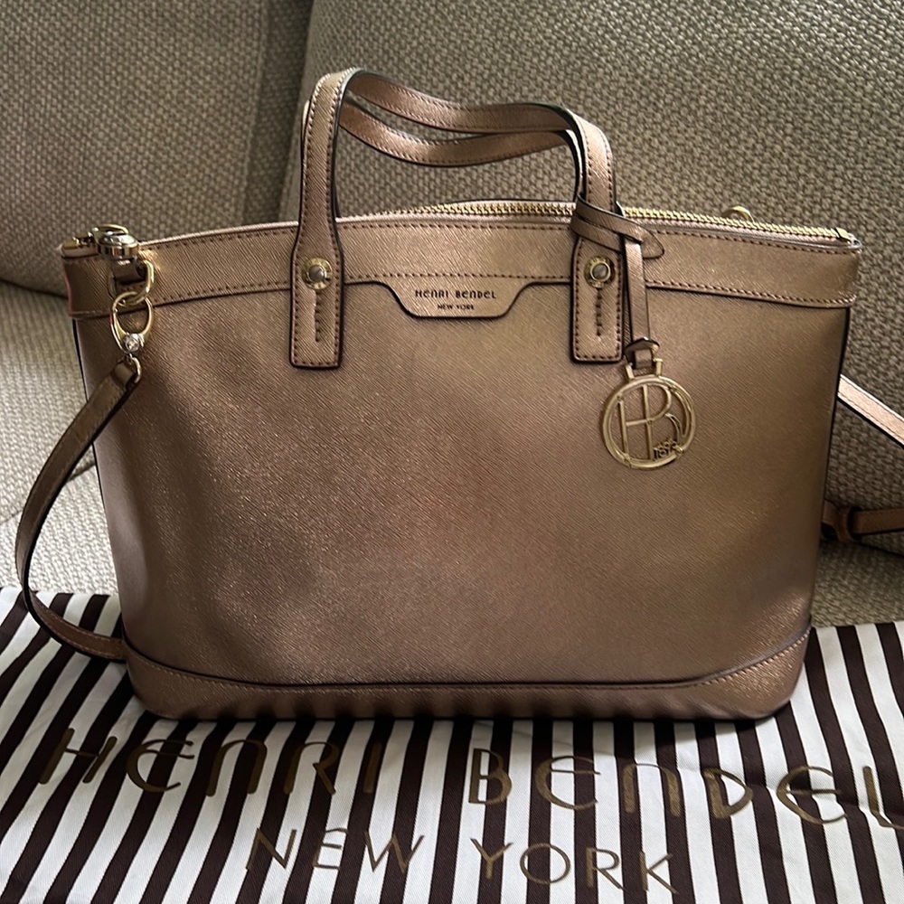 PRE-OWNED like new HENRI BENDEL Metallic Rose Gold Bag with removable strap